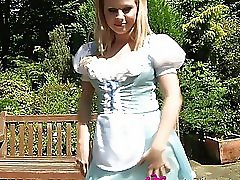 Naughty blonde in maid uniform strips outdoor and has fun