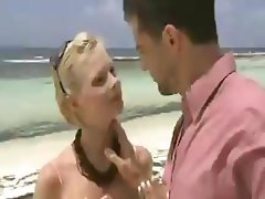 Boroka Balls and Tarra White are in a threesome on the beach
