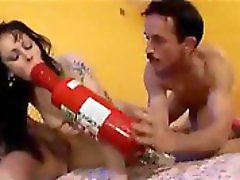 She sucks and gets penetrated by a huge dildo