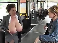 Chick milks her huge tits on a public bus