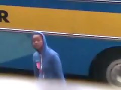 Ebony girl flashing hairy pussy in front of bus