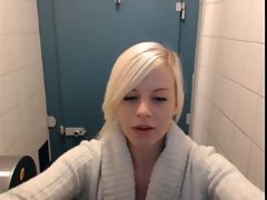 Hot English blonde fingers her pussy in public toilet