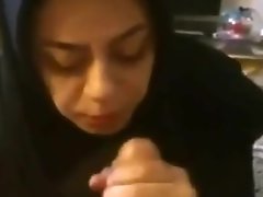 Hijabi woman sucking BIG FAT WHITE ( IRANIAN )COCK.