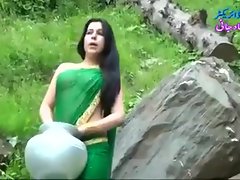 Desi girl in transparent wet saree showing boobs..hot show
