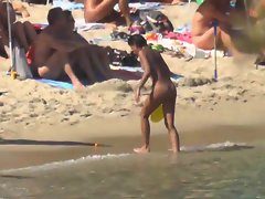 naked arab girl playing water tennis tanned lines sunbathing