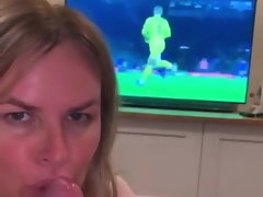 Stepmom suck’s sons cock while he watches the football