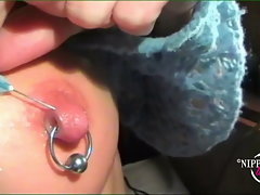 nippleringlover – horny milf pushing needle in pierced nipple after rubbing ice on nipples