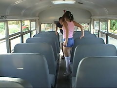 Cute young brunette gets hardcore threesome in the back of a bus