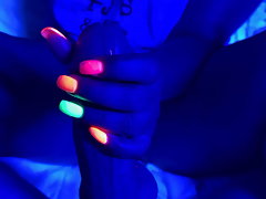 Black light glowing nail handjob